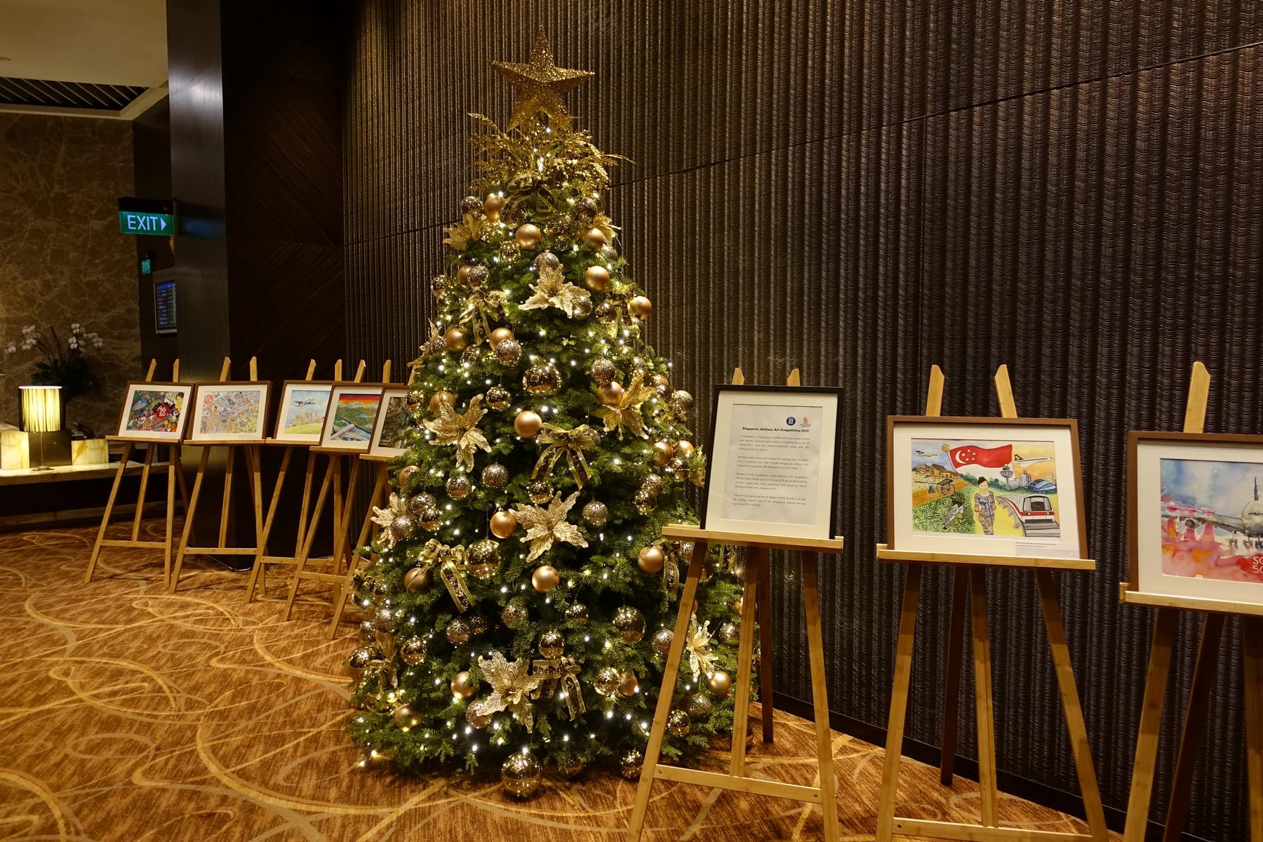 At entrance of the Private Room was a huge lit up Christmas tree surround with various paintings drawn by young Singaporean students